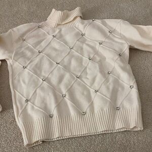 Elegant Cream Sweater with Rhinestone Accents